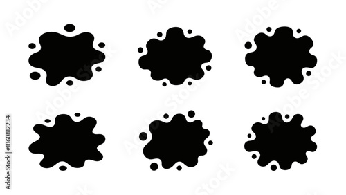 Abstract black ink splatters and blots in a grid pattern on a white background