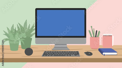 Modern workspace with computer and office supplies on wooden desk.