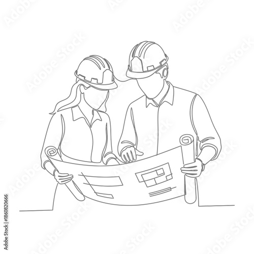 Engineers examining blueprint together.