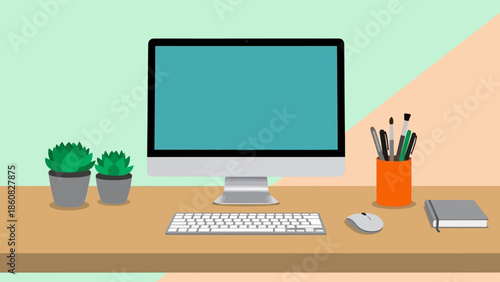 Modern office desk setup with computer and stationery.