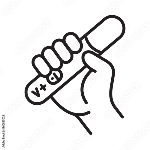 Hand holding a blood pressure monitor checking vital signs health measurement