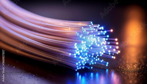 Close up of Blue Light Emitting Fiber Optic Cables on Dark Surface