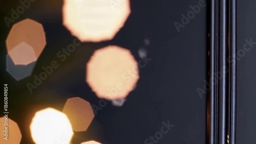 Wallpaper Mural A blurry image of a phone with a black background Torontodigital.ca