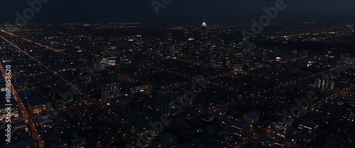 Aerial view of metropolitan city night lights experiencing power outage