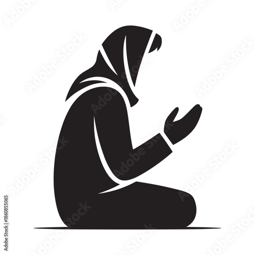 A silhouette of a woman in a hijab praying with hands raised