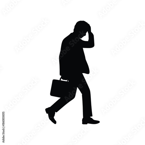 A silhouette of a stressed businessman walking with a briefcase. Walking businessman silhouette. 