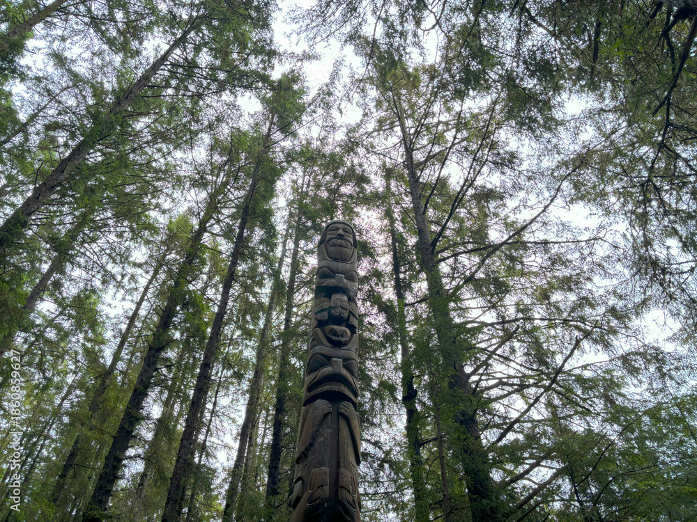 Fototapeta premium Trader Legend Pole in Sitka National Historical Park in Sitka, Alaska in Summer