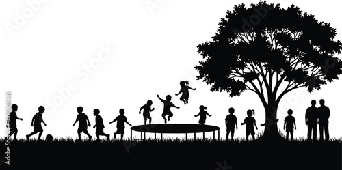 Large Group of Children Silhouettes Playing Soccer and Jumping on Trampoline in Park Under Tree Representing Childhood Joy and Outdoor Activity