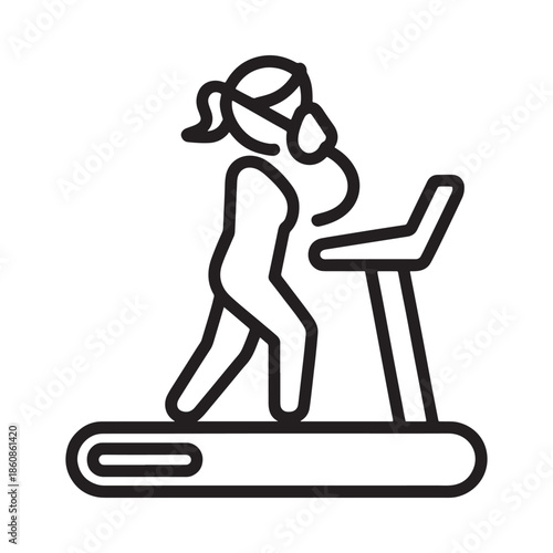 Pregnant woman exercising on a treadmill maintaining health and fitness