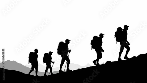 Group of hikers ascending a mountain trail in silhouette.
