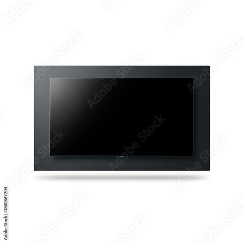 Modern Flat Screen Television Mounted On A Dark Gray Wall With Soft Lighting Indoors