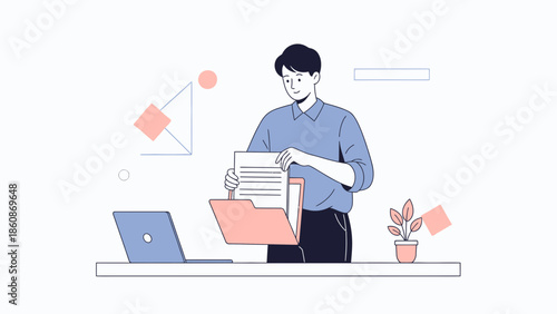 Modern young man working with documents and using laptop in minimalistic office setting