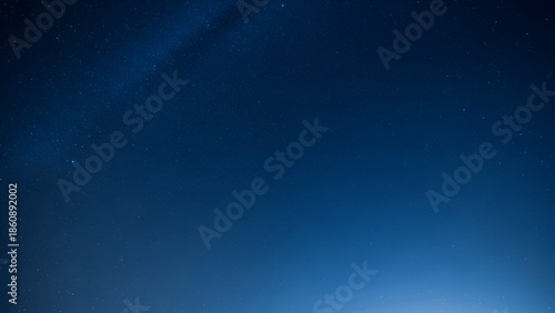 Clear Night Sky Filled with Sparkling Stars and Subtle Milky Way Galaxy Glow