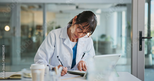Woman, doctor and writing in office for healthcare, prescription or notes. Patient report, administration and tech with mature medical professional and tablet for documents, schedule or planning