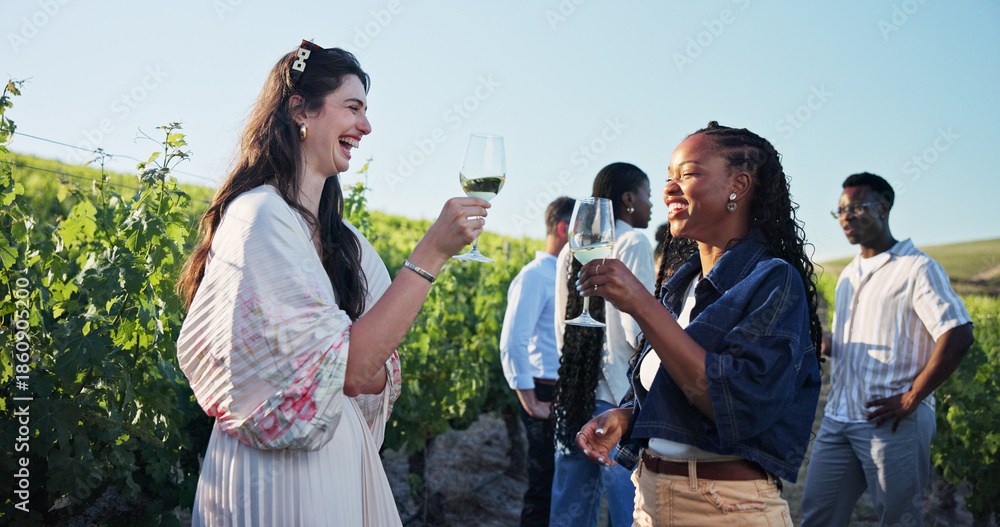 Fototapeta premium Laughing, toast and wine tasting with people on farm together for bonding or experience. Break, cheers and funny with happy girl friends talking outdoor in vineyard for drinks or summer wellness