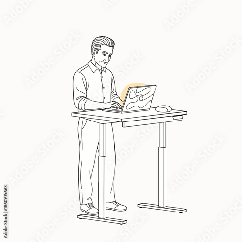 Man working on a laptop at an adjustable standing desk, promoting healthy work habits and modern office ergonomics.