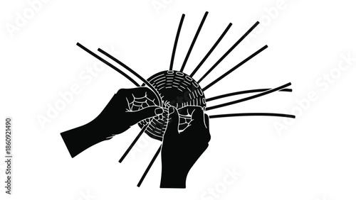 Hands skillfully weaving a circular object with radiating strands, symbolizing creation and craftsmanship.
