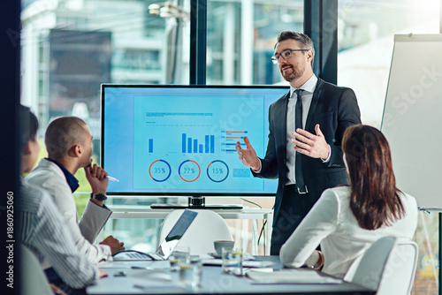 Giving the presentation his all. Cropped shot of a businessperson delivering a presentation in the boardroom.