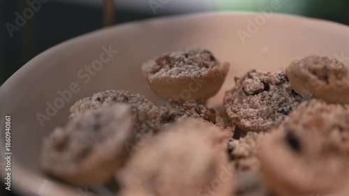 Wallpaper Mural Close-up shot slowly moving toward small pastries dusted with powdered sugar. Torontodigital.ca