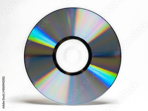 A compact disc with a rainbow-colored reflection on its surface viewed from the front