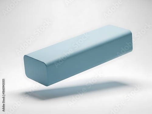 A blue rectangular object floats in mid-air casting a shadow on a white surface