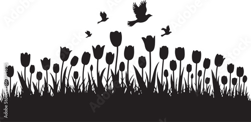 Black silhouette of tulips with flying birds in a field