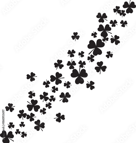 Scattered black shamrock leaves on a white background