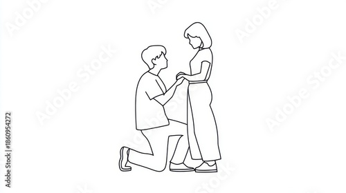 Young man kneeling and proposing to standing woman with ring