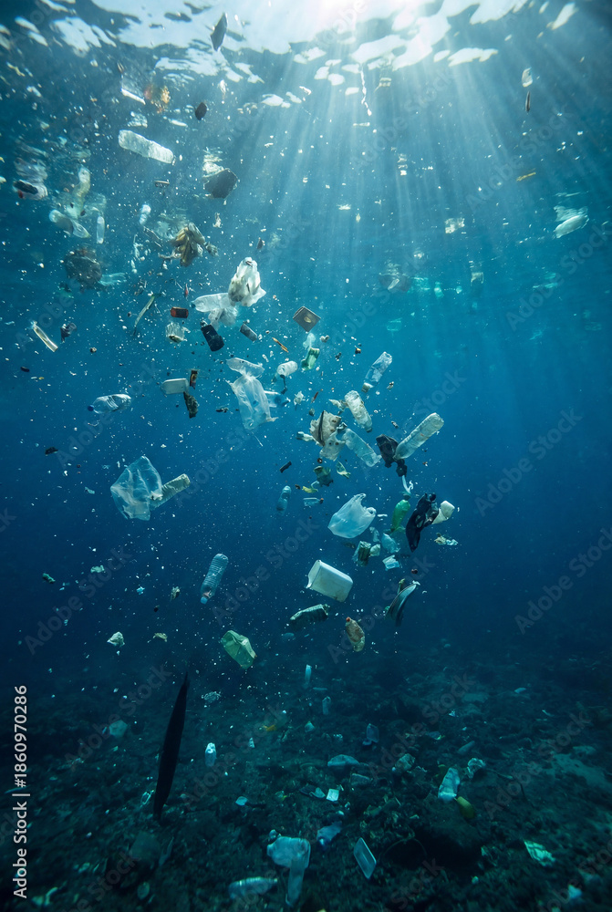 Fototapeta premium Underwater ocean plastic pollution with floating garbage, environmental crisis concept