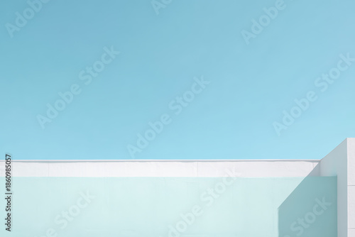 Wallpaper Mural Bright blue sky with a light wall at a modern building during daytime with soft shadows and clear weather Torontodigital.ca