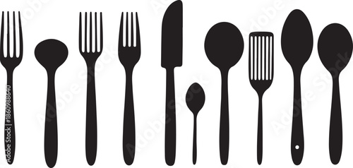 A set of silver stainless steel cutlery including a fork, spoon, and knife isolated on a white background for restaurant dining and kitchen tableware