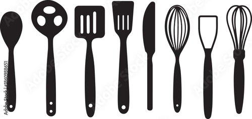 A professional set of isolated silver metal kitchen utensils including a fork, spoon, and knife made of stainless steel silverware for dining and restaurant food service on a white background