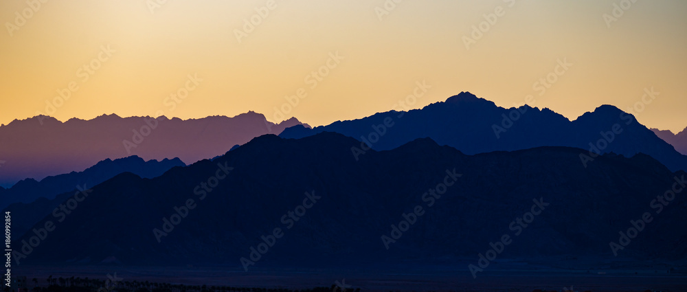 Fototapeta premium abstract silhouette of mountains at sunset