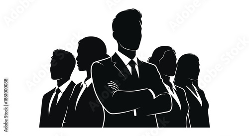 A group of professionals in business attire stands confidently together a striking silhouette