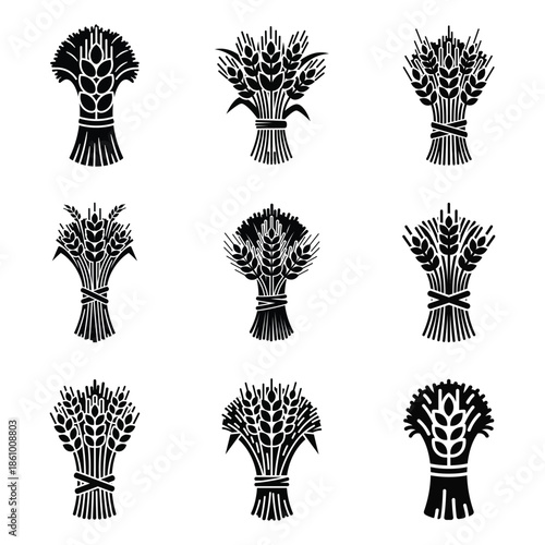 Wheat sheaves icons in black silhouette for agriculture and harvest