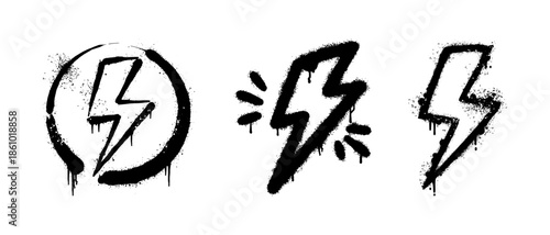 set of black graffiti lightning bolt symbols with spray paint drip texture