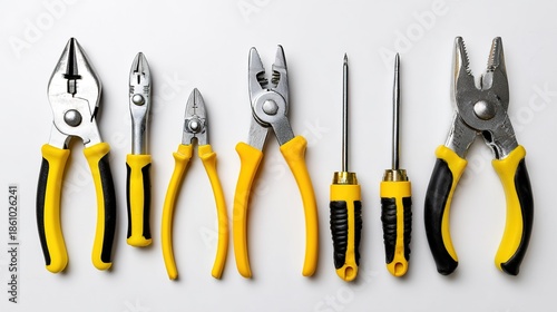 pliers. Neatly arranged toolkit with pliers and screwdrivers on a clean white surface, ready for use. safety posters.