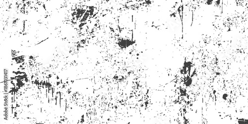 Abstract grunge art design featuring a dark black ink splat pattern with liquid spray splatter and dirty paint texture on a stained paper border element