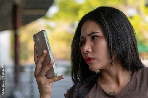 Thai Girl Smiles and Enjoys her food 