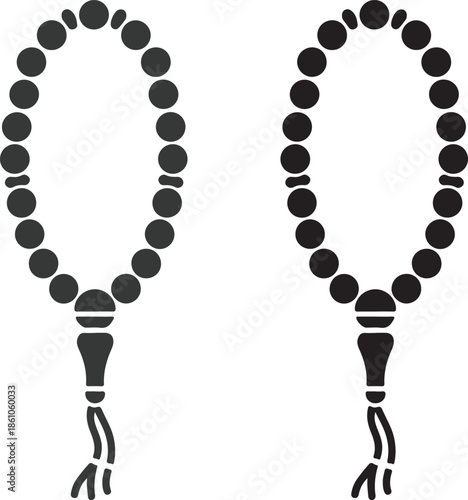 Two black islamic prayer beads or tasbih on a white background