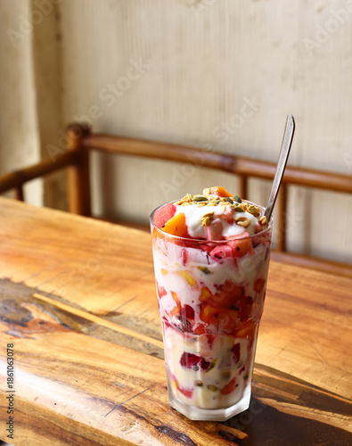 Fruit and granola parfait and yogurt for dessert and healthy eating