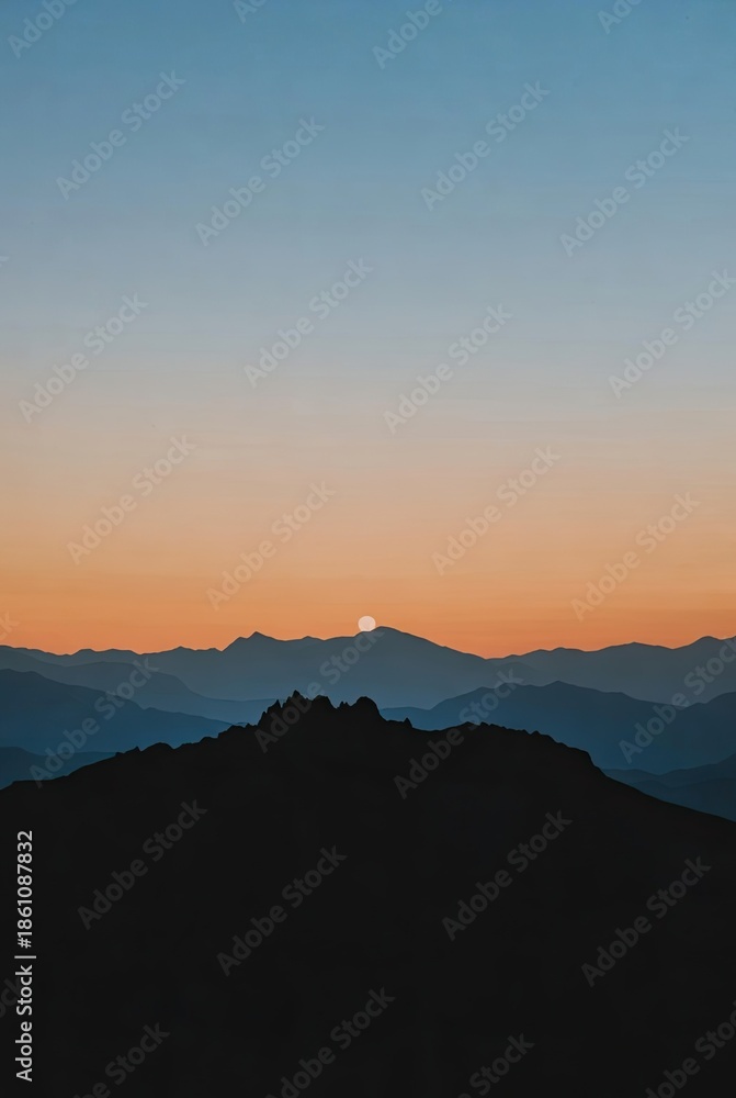 Fototapeta premium Majestic mountain landscape at sunrise or sunset with a vibrant gradient sky and layered