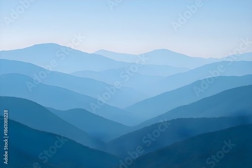 Tranquil Blue Mountain Layers Panorama with Misty Atmospheric Depth