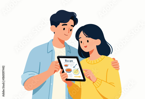 Couple looking at a recipe on a tablet
