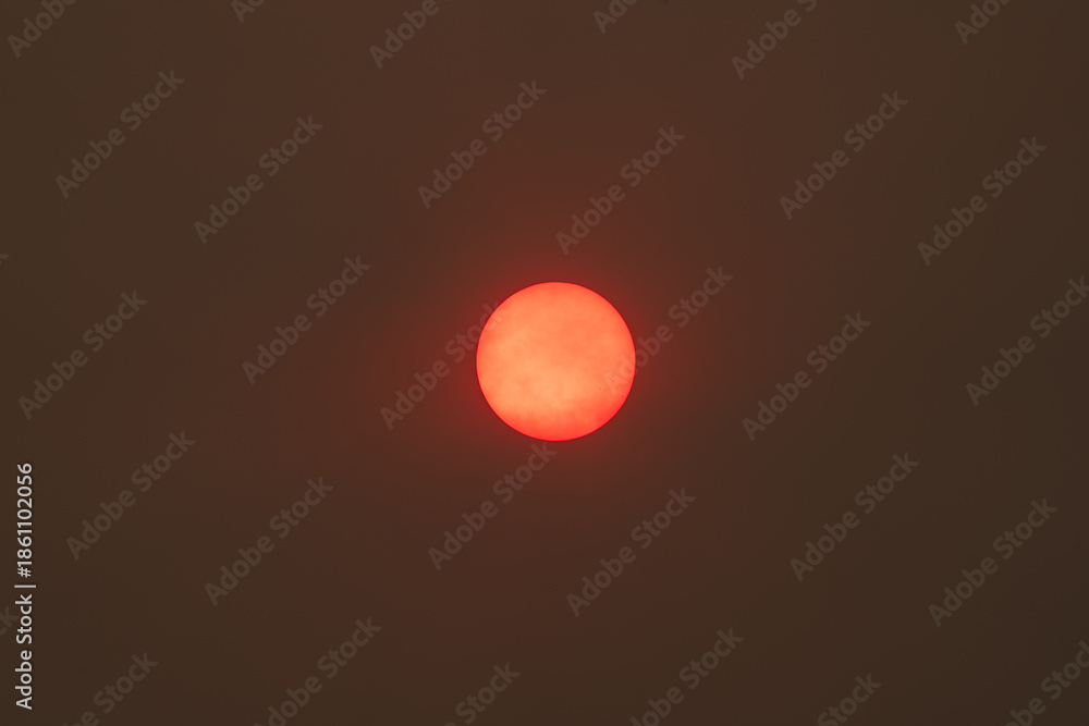 custom made wallpaper toronto digitalIntense Red Sun in a Smoky Sky