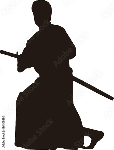 刀を持った侍の構えのシルエット