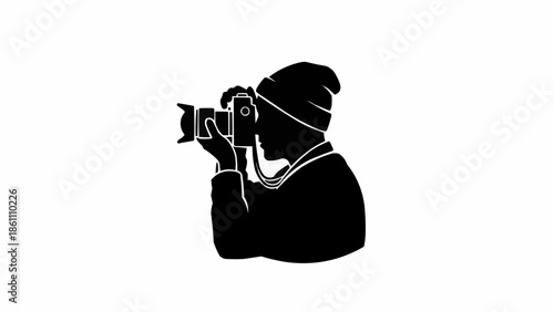 Silhouette of a person holding a camera and taking a photo.
