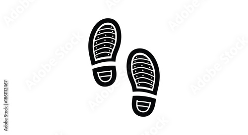 A striking visual representation of two black shoe prints on a clean white background silhouette