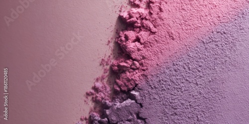 Colorful powder mixing on a pastel surface