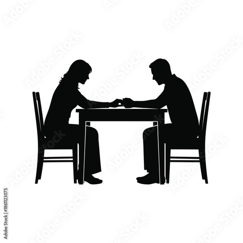 Silhouetted Couple Engaged in Competitive Arm Wrestling